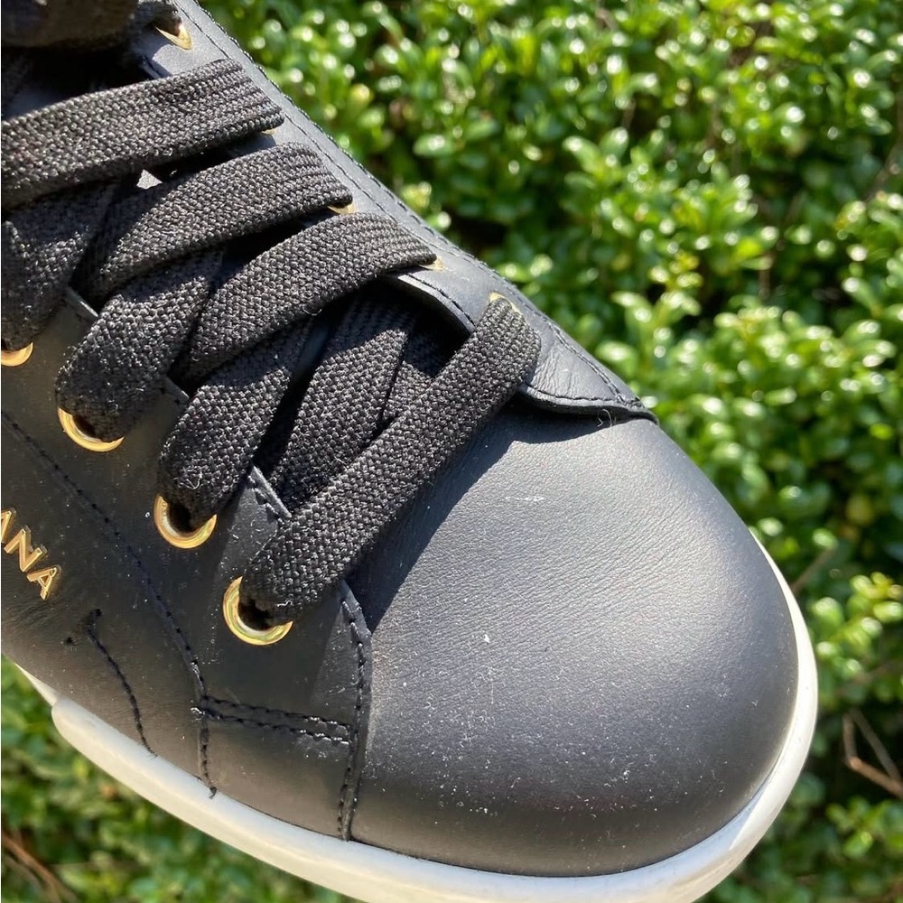 Dolce & Gabbana Black and Gold Sneakers Sleek Design